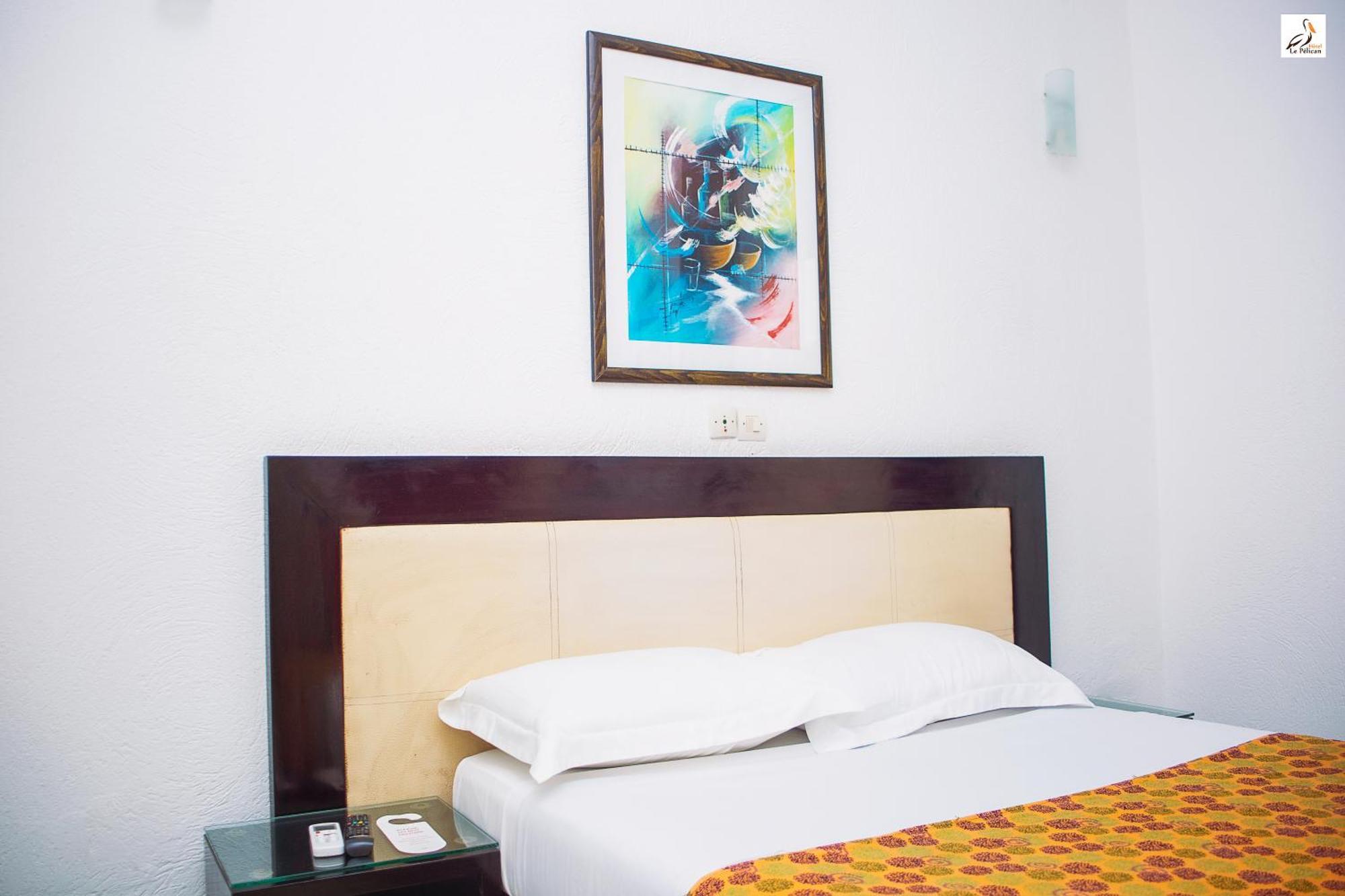 Hotel Le Pelican Ломе Экстерьер фото
